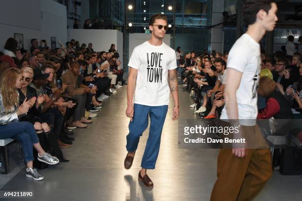 Harvey Newton-Haydon walks the runway at the Oliver Spencer SS18 Catwalk Show during London Fashion Week Men's June 2017 on June 9, 2017 in London,...