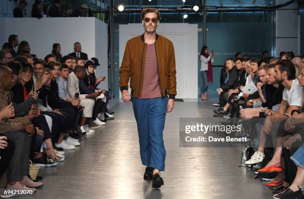 Richard Biedul walks the runway at the Oliver Spencer SS18 Catwalk Show during London Fashion Week Men's June 2017 on June 9, 2017 in London, England.