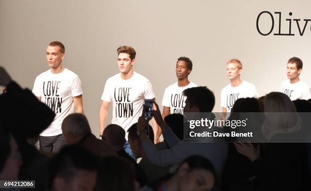 Isaac Carew, Kyle De'Volle and models walk the runway at the Oliver Spencer SS18 Catwalk Show during London Fashion Week Men's June 2017 on June 9,...