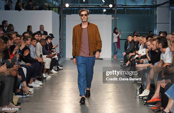 Richard Biedul walks the runway at the Oliver Spencer SS18 Catwalk Show during London Fashion Week Men's June 2017 on June 9, 2017 in London, England.