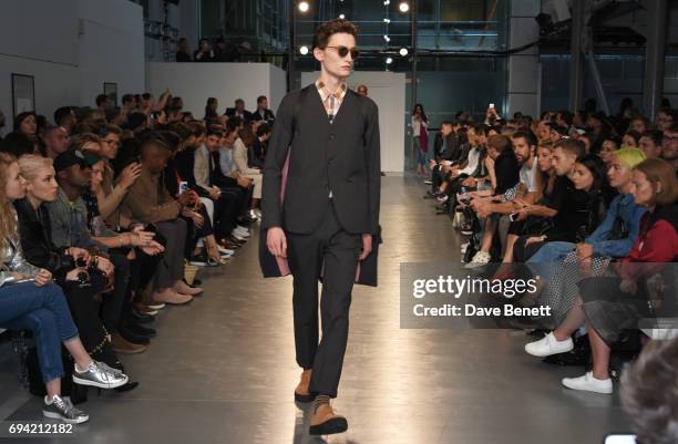 Model walk the runway at the Oliver Spencer SS18 Catwalk Show during London Fashion Week Men's June 2017 on June 9, 2017 in London, England.