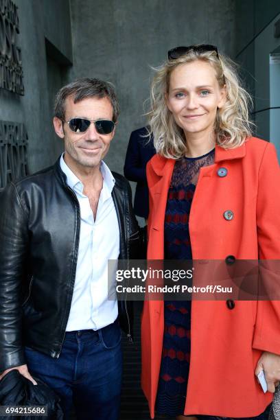 Journalist David Pujadas and actress Claire Borotra attend the 2017 French Tennis Open - Day Thirteen at Roland Garros on June 9, 2017 in Paris,...