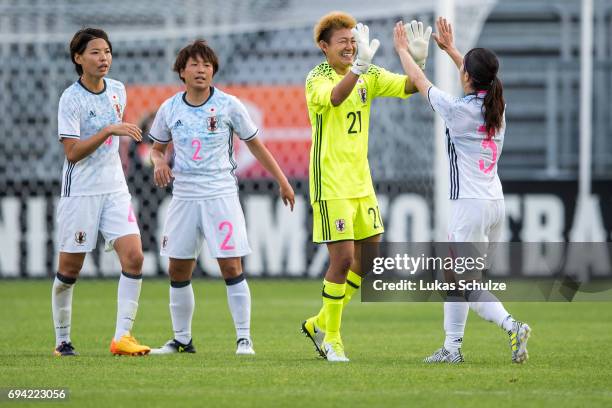 Saki Kumagai , Hikari Takagi, Goalkeeper Ayake Yamashita and Aya Sameshima of Japan celebrate after winning« the Women's International Friendly match...
