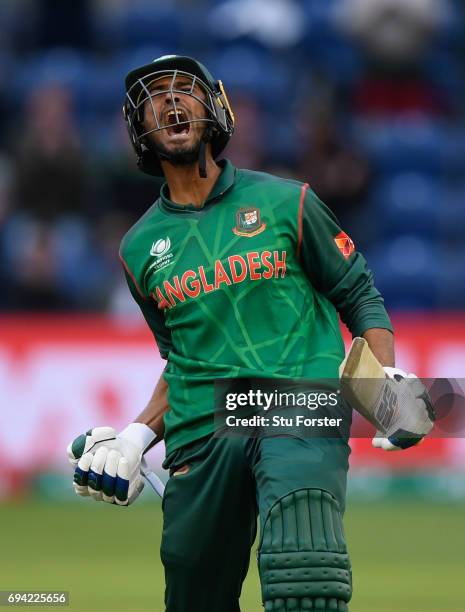 Bangladesh batsman Mohammad Mahmudullah celebrates after hitting the winning runs during the ICC Champions Trophy match between New Zealand and...