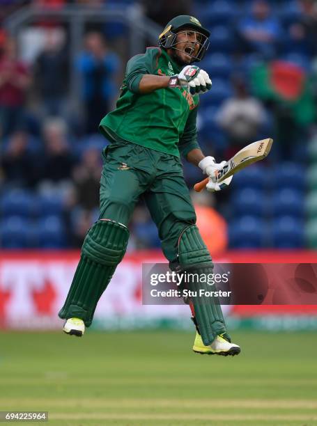 Bangladesh batsman Mohammad Mahmudullah celebrates after hitting the winning runs during the ICC Champions Trophy match between New Zealand and...