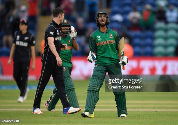 Bangladesh batsman Mohammad Mahmudullah celebrates after hitting the winning runs during the ICC Champions Trophy match between New Zealand and...