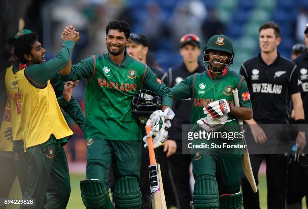 Bangladesh batsman Mohammad Mahmudullah celebrates with team mates after hitting the winning runs during the ICC Champions Trophy match between New...