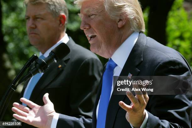 President Donald Trump and Romanian President Klaus Iohannis hold a joint news conference in the Rose Garden at the White House June 9, 2017 in...