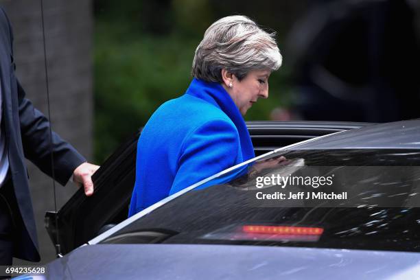 Britain's Prime Minister and leader of the Conservative Party Theresa May leaves 10 Downing Street en route to Buckingham Palace to meet Queen...