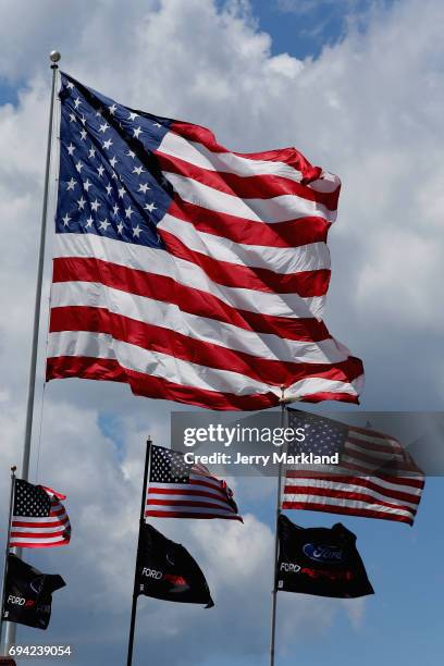 American flags are seen waving during practice for the NASCAR XFINITY Series Pocono Green 250 at Pocono Raceway on June 9, 2017 in Long Pond,...