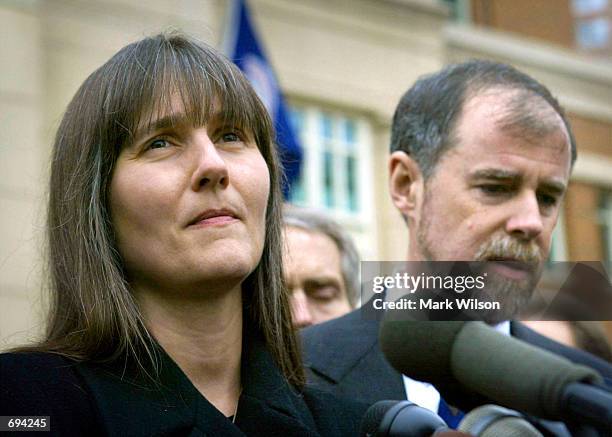 Marilyn Walker and Frank Lindh, parents of American Taliban fighter John Walker Lindh, speak to the media after their son made his first appearance...
