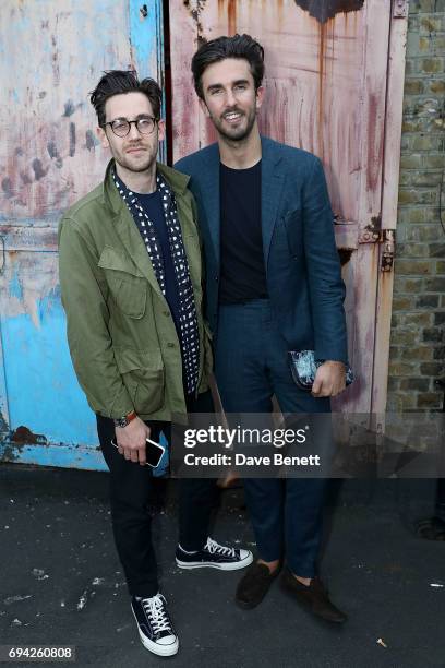 Charlie Teasdale and Teo van den Broeke attend 'TOPMAN DESIGN Presents Transition' for LFWM at The Truman Brewery on June 9, 2017 in London, England.