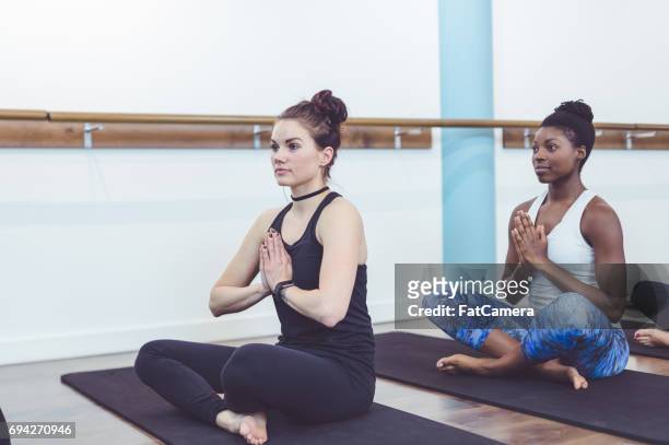 multi-ethnic group of women doing barre workout - leg waxing stock pictures, royalty-free photos & images