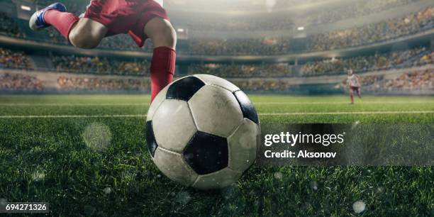 close up soccer kids player with ball - foot kicking stock pictures, royalty-free photos & images