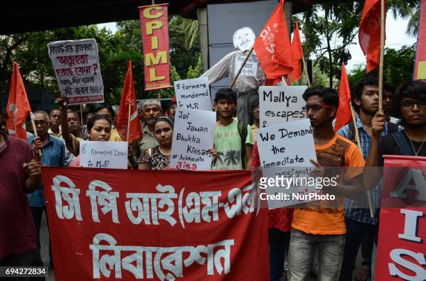 Activists of Communist Party of India protest against killing of five farmers of Mandsaur police firing incident, at Madhya Pradesh government office...
