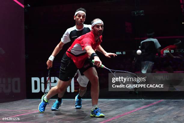 Mohamed El Shorbagy of Egypt competes against Simon Rosner of Germany during the semifinals of the PSA Dubai World Series Finals 2017 at Dubai Opera...