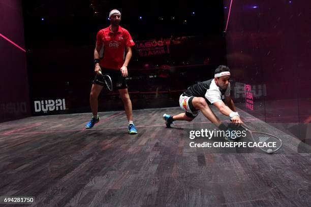 Mohamed El Shorbagy of Egypt competes against Simon Rosner of Germany during the semifinals of the PSA Dubai World Series Finals 2017 at Dubai Opera...