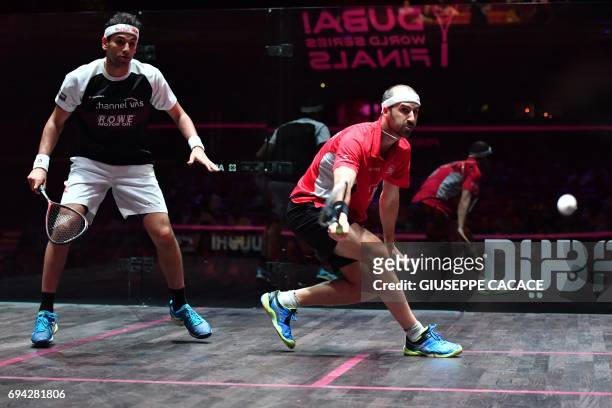 Mohamed El Shorbagy of Egypt competes against Simon Rosner of Germany during the semifinals of the PSA Dubai World Series Finals 2017 at Dubai Opera...