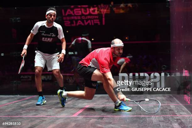 Mohamed El Shorbagy of Egypt competes against Simon Rosner of Germany during the semifinals of the PSA Dubai World Series Finals 2017 at Dubai Opera...