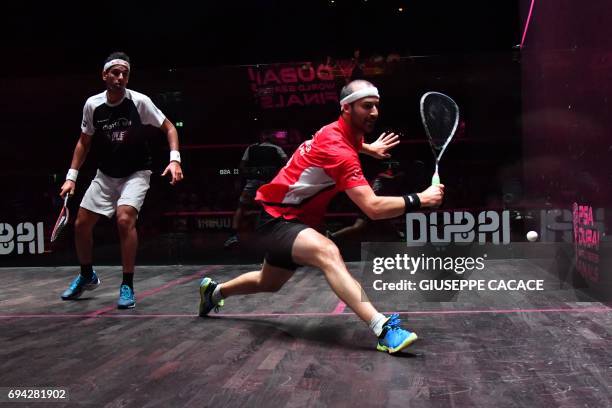 Mohamed El Shorbagy of Egypt competes against Simon Rosner of Germany during the semifinals of the PSA Dubai World Series Finals 2017 at Dubai Opera...