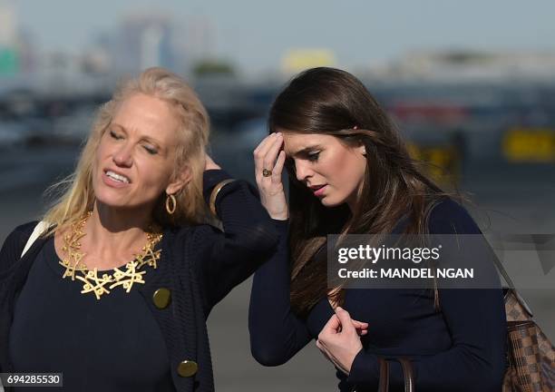 Counselor to the president Kellyanne Conway and White House Director of Strategic Communications Hope Hicks are seen on the tarmac of Newark Liberty...
