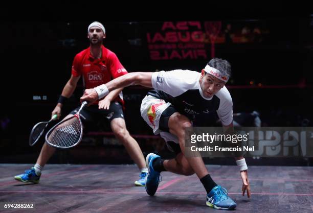 Mohamed El Shorbagy of Egypt competes against Simon Rösne of Germany during the men's semi final match on day four of the PSA Dubai World Series...
