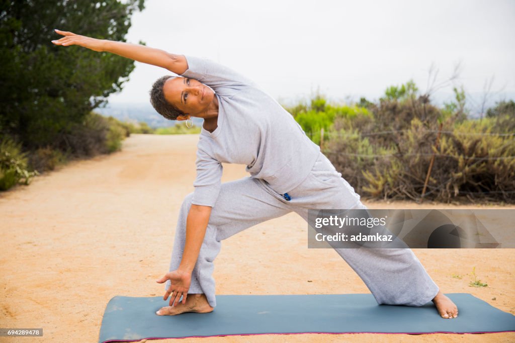 African American Senior Woman Yoga Instructor