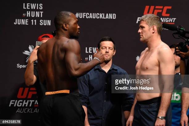 Derek Brunson of the United States and Daniel Kelly of Australia face off during the UFC Fight Night weigh-in at Spark Arena on June 10, 2017 in...