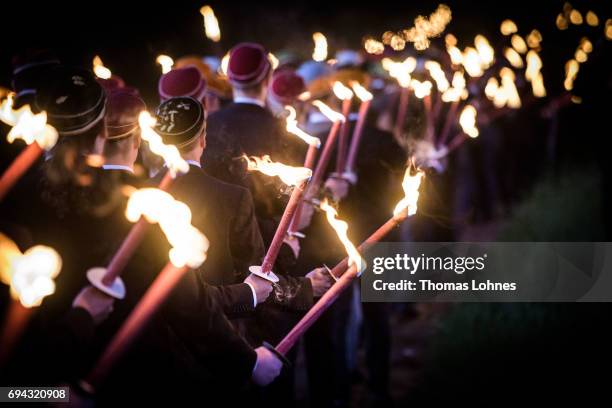 Members of Burschenschaften, the tradition-rich fraternities of German universities, gather for a torchlight processionat to the Burschenschaften...