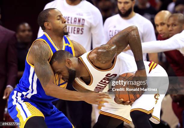 Andre Iguodala of the Golden State Warriors defends LeBron James of the Cleveland Cavaliers in the first quarter in Game 4 of the 2017 NBA Finals at...