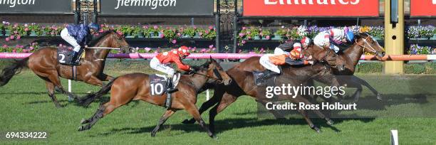 Andaz ridden by Ben Melham deadbeats with Royal Phoenix ridden by James Winks in the Eugene Gorman Handicap at Flemington Racecourse on June 10, 2017...