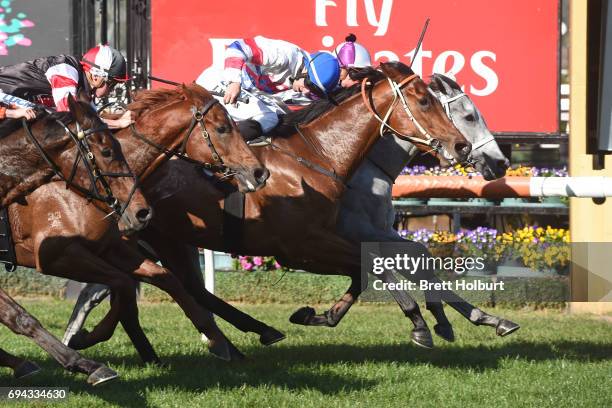 Andaz ridden by Ben Melham dead heats with Royal Phoenix ridden by James Winks the Eugene Gorman Handicap at Flemington Racecourse on June 10, 2017...