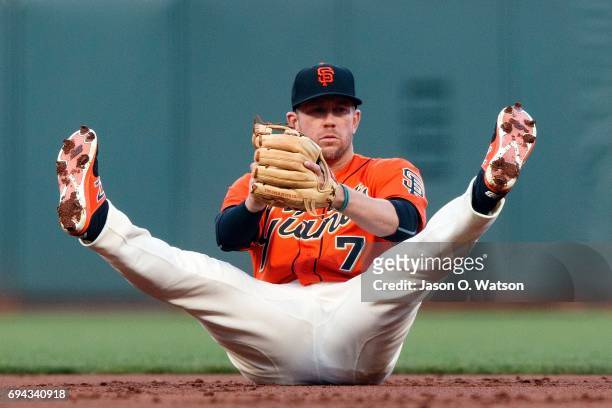 Aaron Hill of the San Francisco Giants catches a line drive hit off the bat of Max Kepler of the Minnesota Twins during the second inning at AT&T...