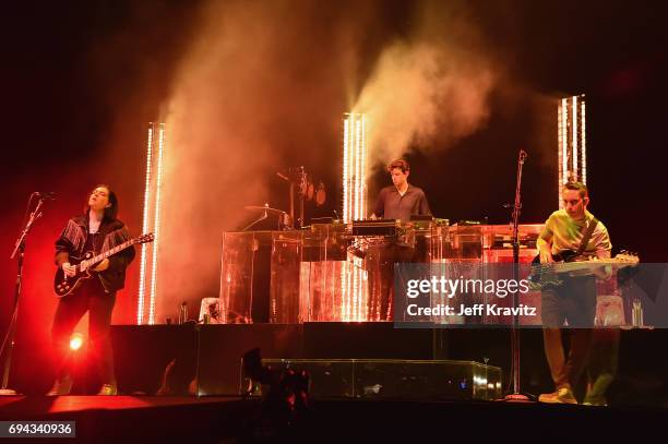 Recording artists Romy Madley Croft, Jamie xx, and Oliver Sim of The xx perform onstage at What Stage during Day 2 of the 2017 Bonnaroo Arts And...