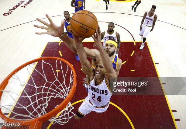 JaVale McGee of the Golden State Warriors defends Richard Jefferson of the Cleveland Cavaliers in the first quarter in Game 4 of the 2017 NBA Finals...