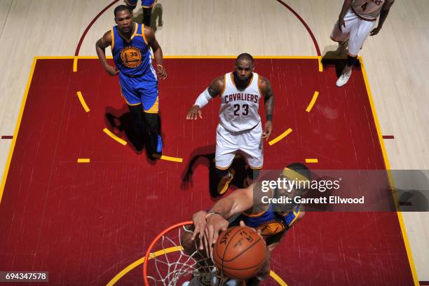 JaVale McGee of the Golden State Warriors attempts to block a shot against the Cleveland Cavaliers in Game Four of the 2017 NBA Finals on June 9,...