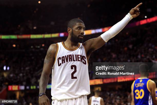 Kyrie Irving of the Cleveland Cavaliers gestures to the crowd in the third quarter against the Golden State Warriors in Game 4 of the 2017 NBA Finals...