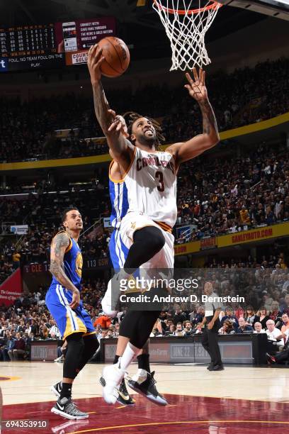 Derrick Williams of the Cleveland Cavaliers goes up for a lay up against the Golden State Warriors in Game Four of the 2017 NBA Finals on June 9,...