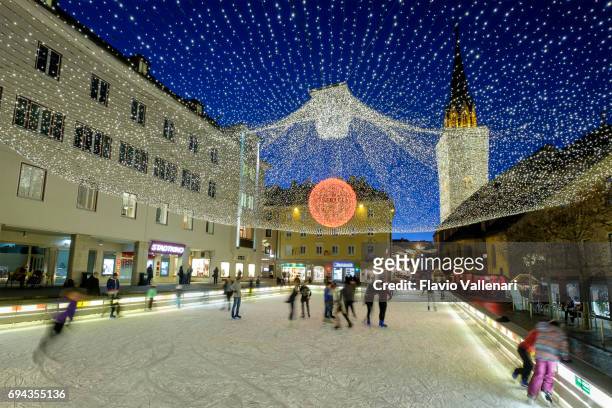 villach at christmas, ice skating rink - austria - villach stock pictures, royalty-free photos & images