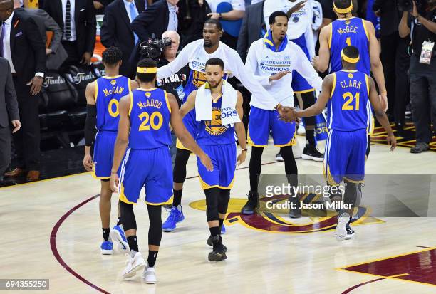 Stephen Curry of the Golden State Warriors reacts with teammates after being defeated by the Cleveland Cavaliers in Game 4 of the 2017 NBA Finals at...