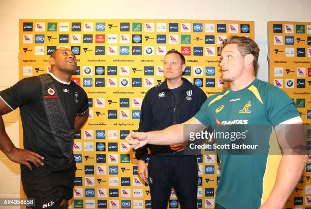 Wallabies captain Michael Hooper and Fiji captain Akapusi Qera toss the coin during the International Test match between the Australian Wallabies and...