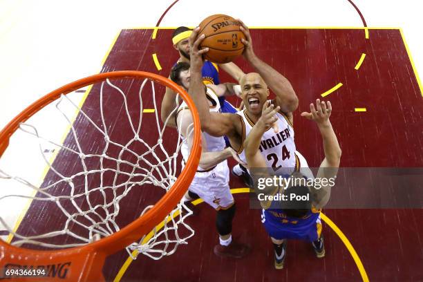 Richard Jefferson of the Cleveland Cavaliers drives to the basket against Klay Thompson of the Golden State Warriors in the first half in Game 4 of...