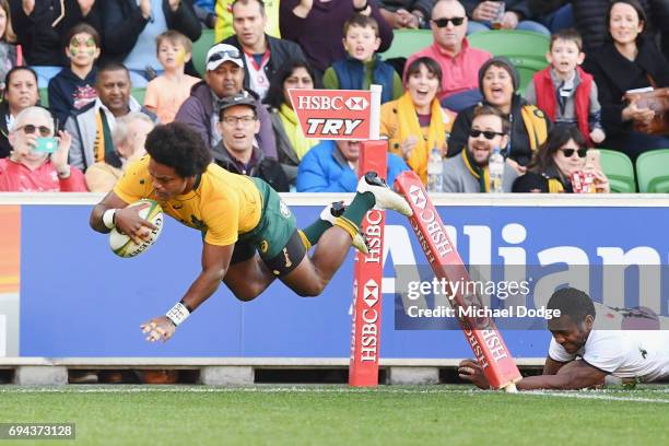 Henry Speight of the Wallabies scores a try during the International Test match between the Australian Wallabies and Fiji at AAMI Park on June 10,...