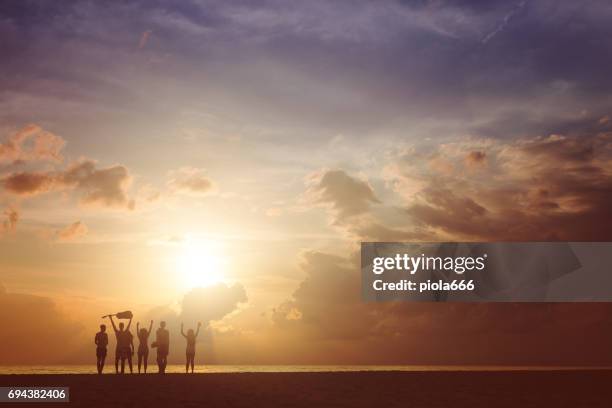 summer vacation with friends: beach party at sunset - italian union stock pictures, royalty-free photos & images