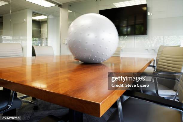 relaxing start to business meeting - stress ball stock pictures, royalty-free photos & images