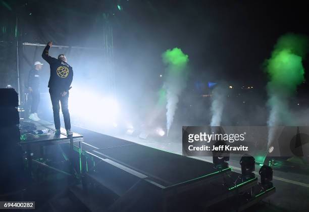 Recording artist Walshy Fire and Diplo of Major Lazer performs onstage at What Stage during Day 2 of the 2017 Bonnaroo Arts And Music Festival on...