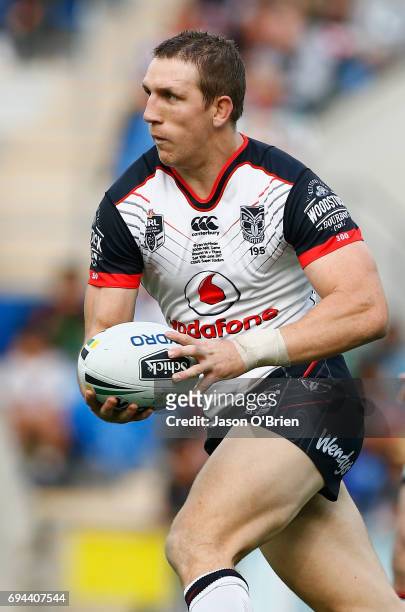 Ryan Hoffman of the warriors runs with the ball during the round 14 NRL match between the Gold Coast Titans and the New Zealand Warriors at Cbus...