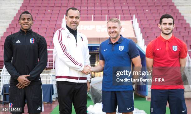 Wuilker Farinez of Venezuela, head coach Rafael Dudamel of Venezuela, head coach Paul Simpson of England and Lewis Cook of England pose for a picture...