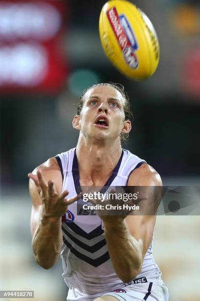 Nat Fyfe of the Dockers takes a mark during the round 12 AFL match between the Brisbane Lions and the Fremantle Dockers at The Gabba on June 10, 2017...