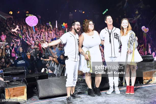 Recording artist Jeremy Salken and Dominic Lalli of Big Gigantic pose onstage with musicians at What Stage during Day 2 of the 2017 Bonnaroo Arts And...